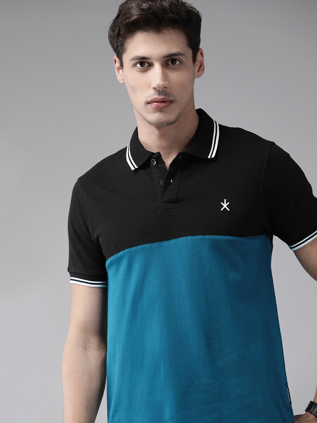 

Roadster Men Black & Teal Blue Pure Cotton Colourblocked Polo Collar T-shirt