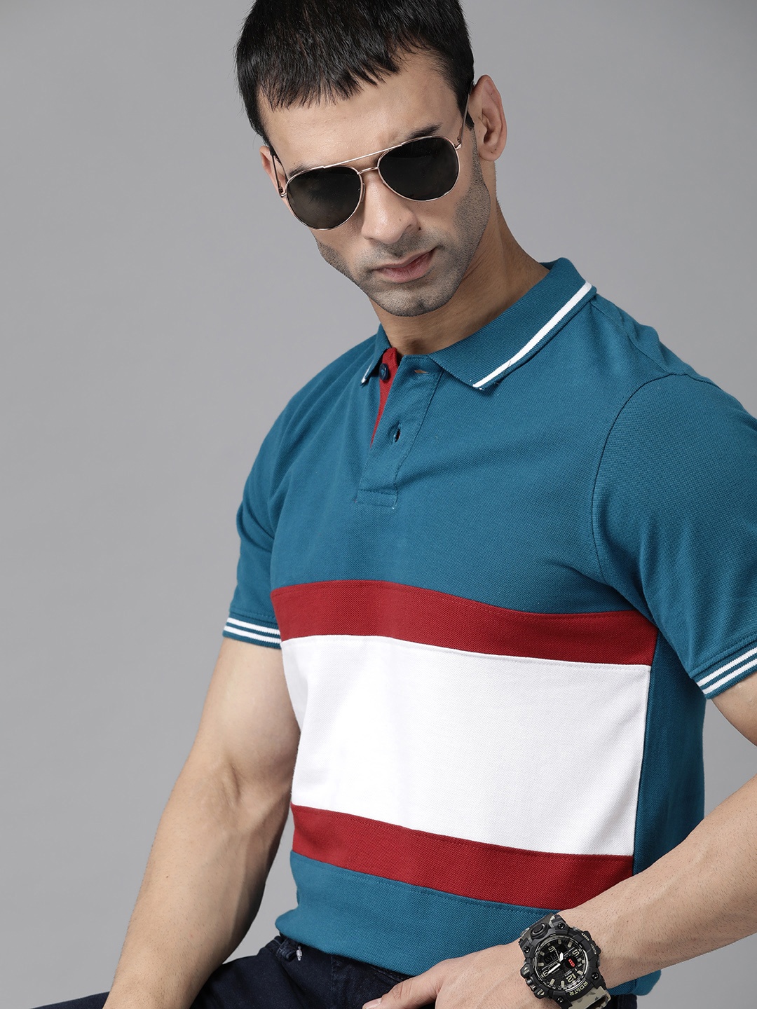 

Roadster Men Teal Blue & White Pure Cotton Colourblocked Polo Collar T-shirt