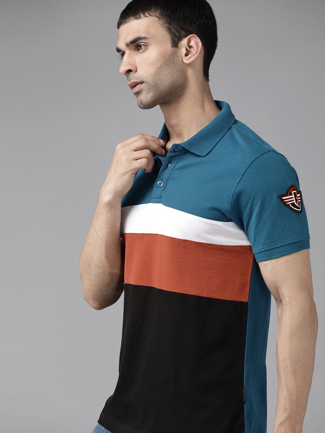 

Roadster Men Black & Teal Blue Pure Cotton Colourblocked Polo Collar T-shirt