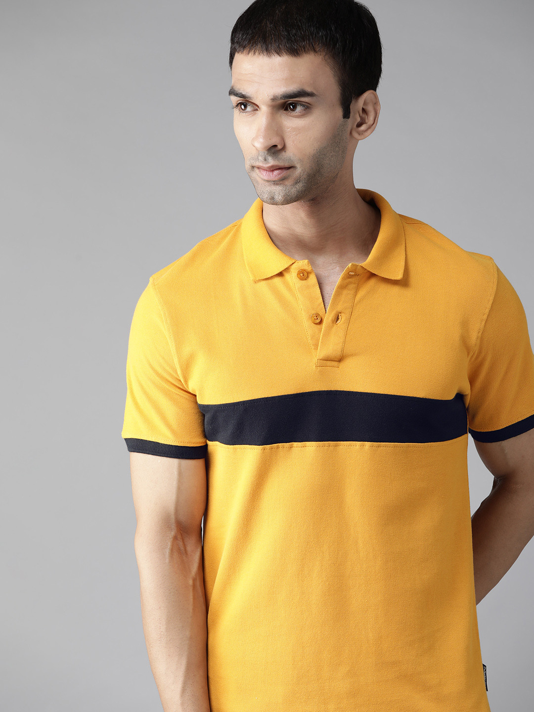 

Roadster Men Yellow & Black Pure Cotton Polo Collar T-shirt with Contrast Panelling