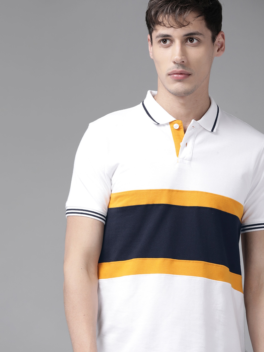 

Roadster Men White & Navy Blue Pure Cotton Colourblocked Polo Collar T-shirt
