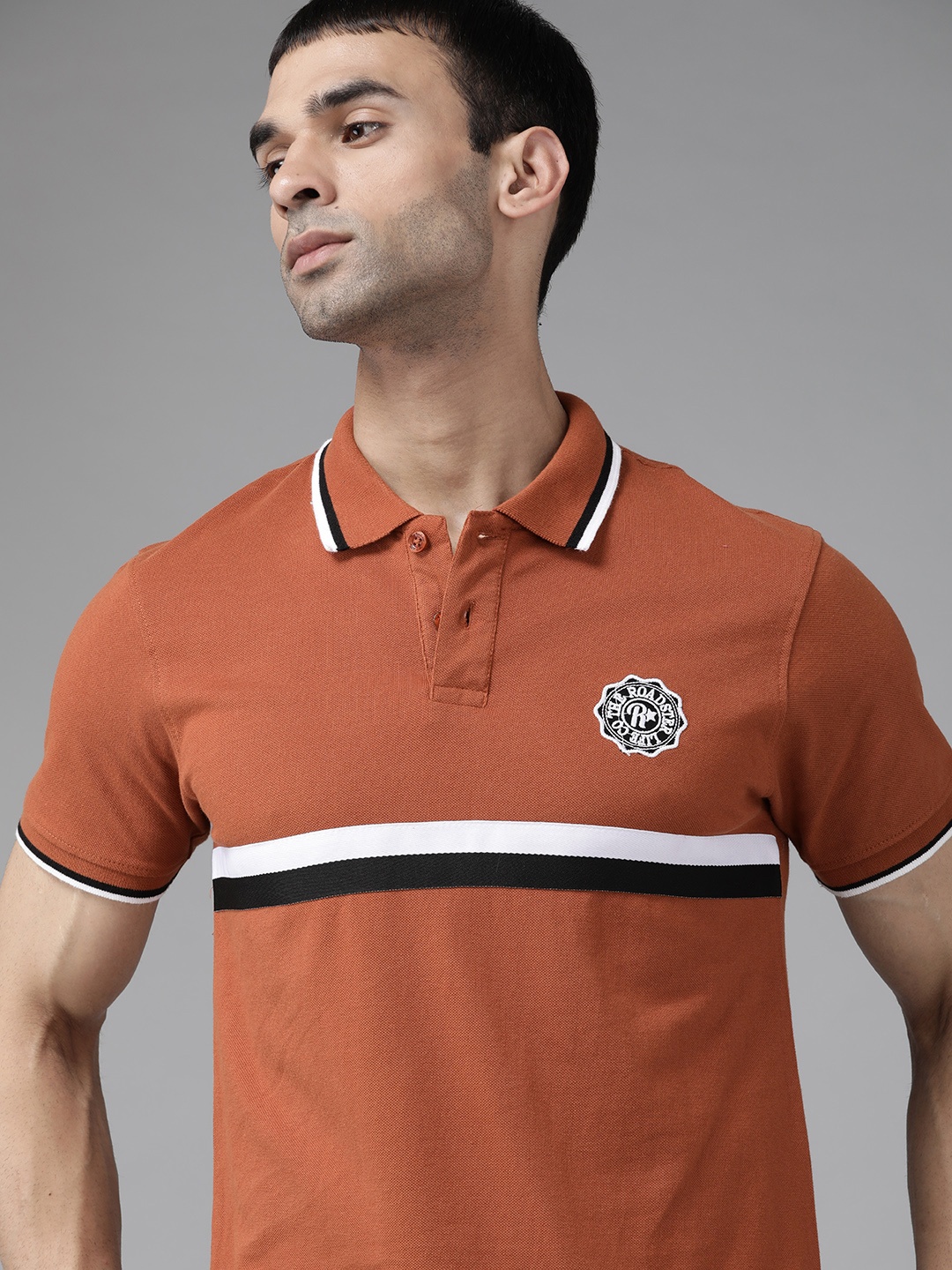 

Roadster Men Rust Striped Polo Collar T-shirt