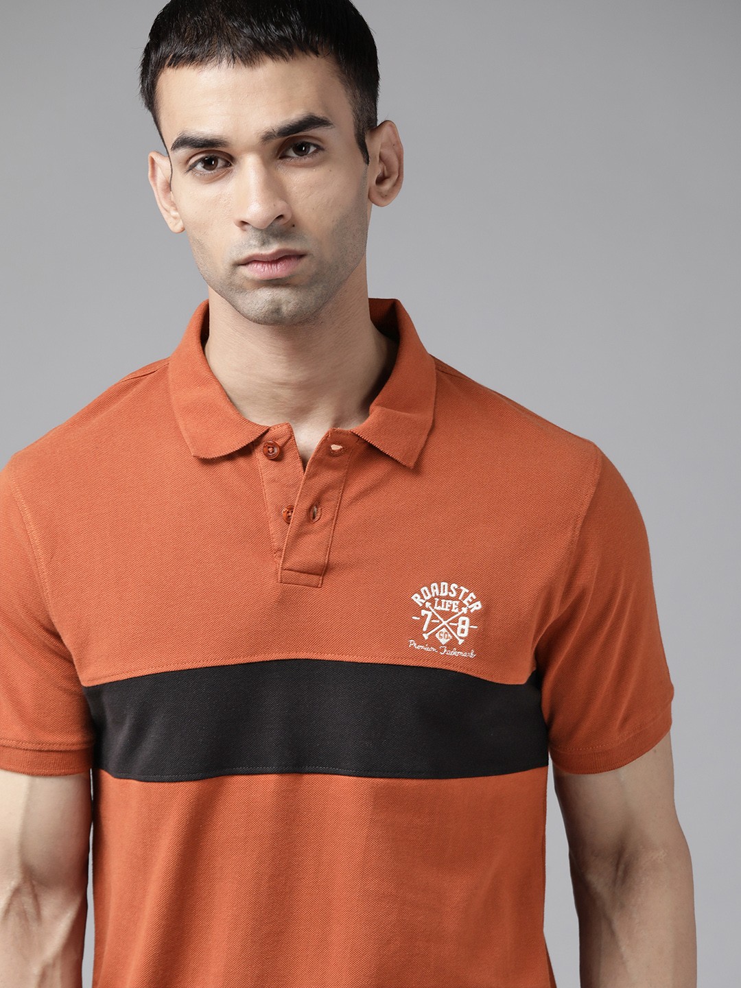 

Roadster Men Rust Orange & Black Pure Cotton Striped Polo Collar T-shirt