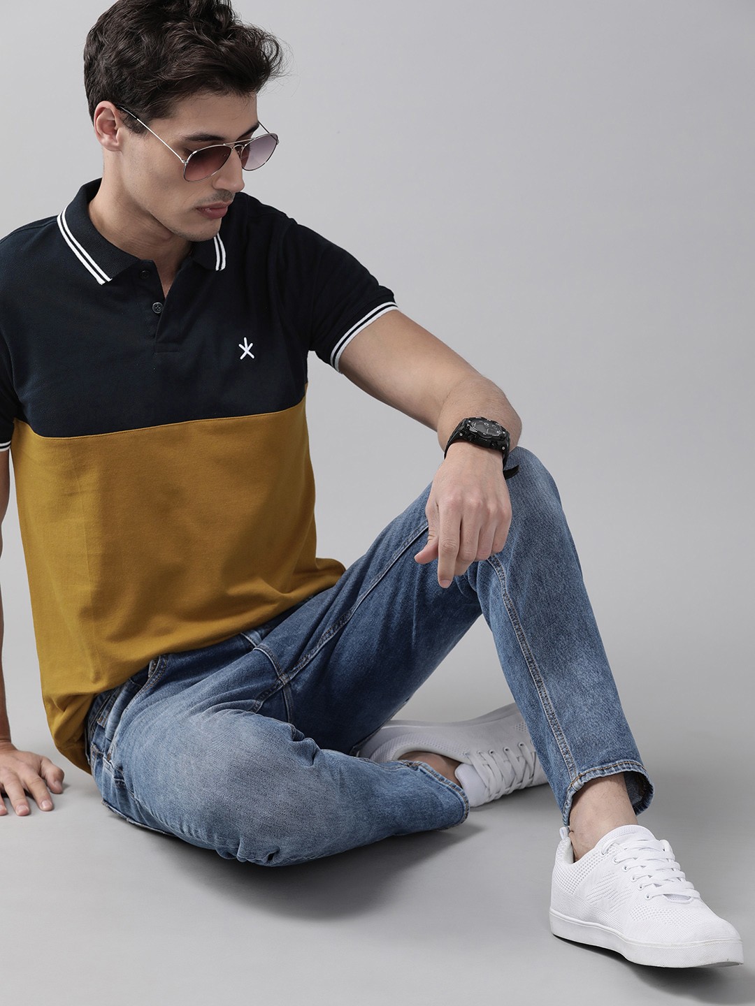 

Roadster Men Navy Blue & Mustard Brown Pure Cotton Colourblocked Polo Collar T-shirt