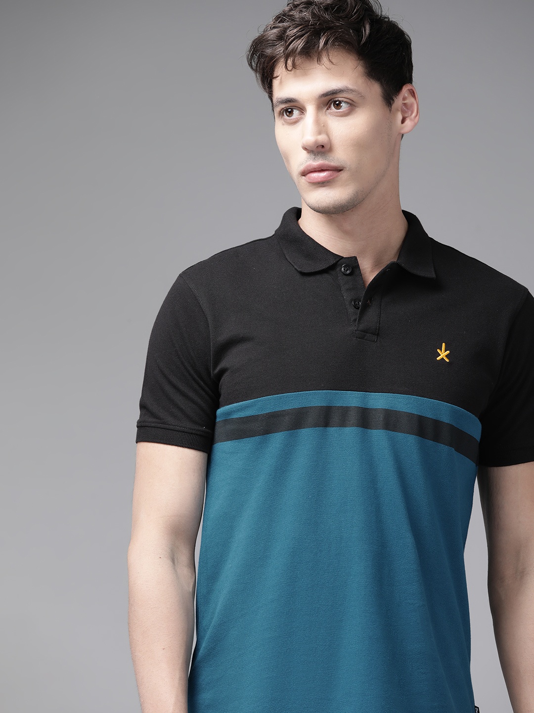 

Roadster Men Black & Blue Pure Cotton Colourblocked Polo Collar T-shirt