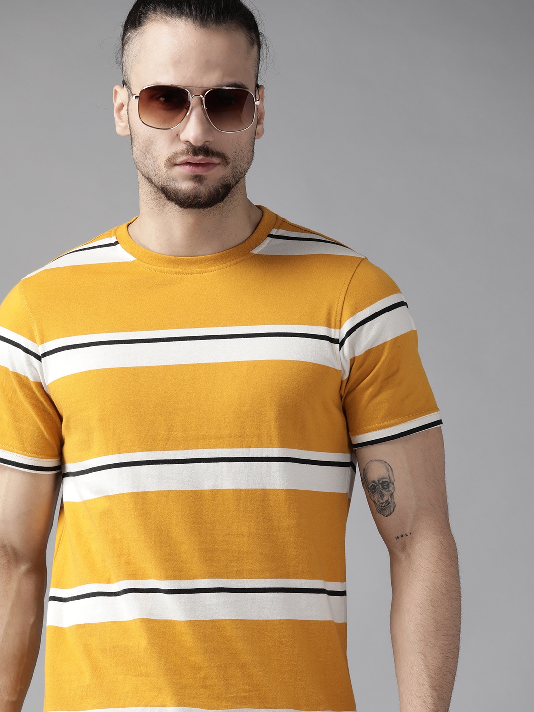 

Roadster Men Yellow & White Cotton Striped T-shirt