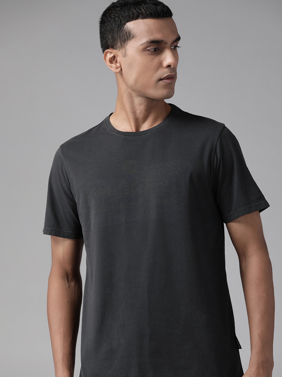 

Roadster Men Black Solid Pure Cotton T-shirt