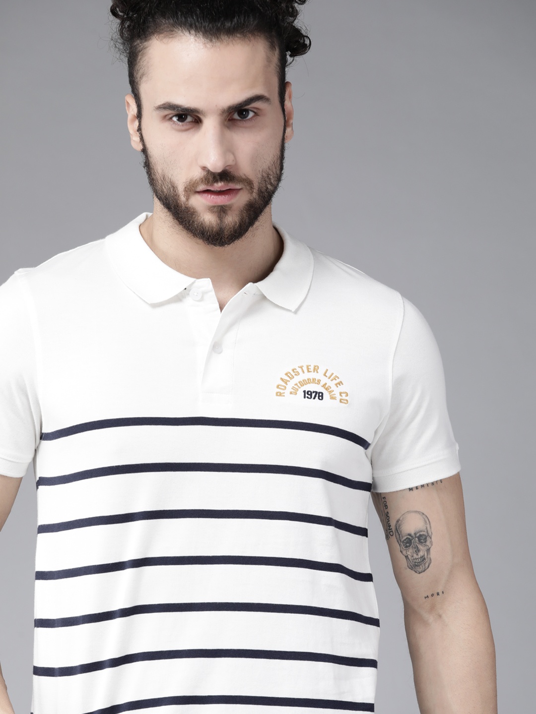 

Roadster Men White & Navy Blue Pure Cotton Striped Polo Collar T-shirt