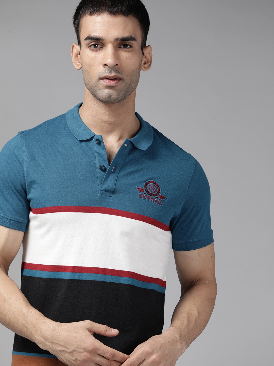 

Roadster Men Blue & White Pure Cotton Striped Polo Collar T-shirt