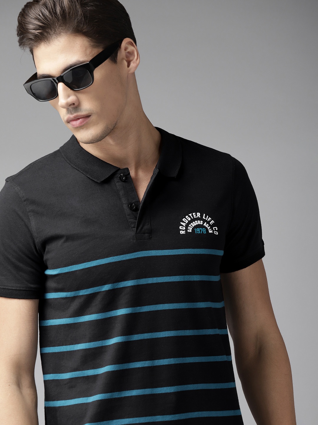 

Roadster Men Black & Blue Striped Polo Collar Cotton T-shirt