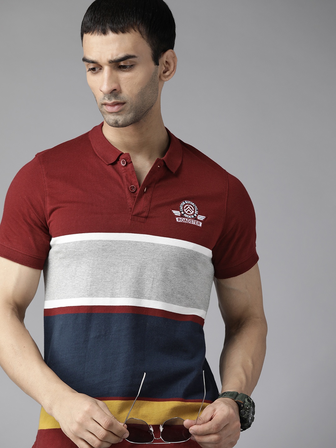 

Roadster Men Maroon & Navy Blue Colourblocked Polo Collar T-shirt