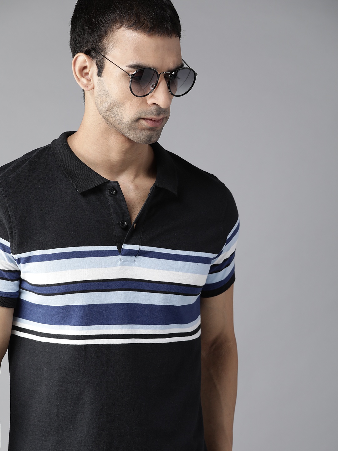 

Roadster Men Black & White Pure Cotton Striped Polo Collar T-shirt