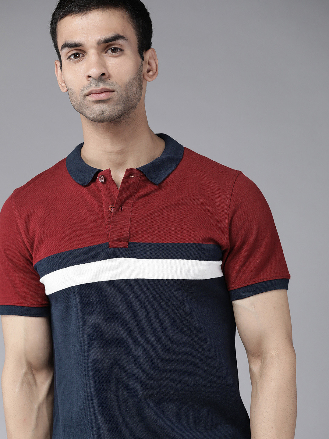 

Roadster Men Navy Blue & Maroon Cotton Colourblocked Polo Collar T-shirt