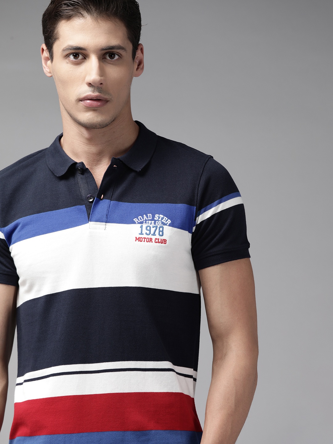 

Roadster Men Navy Blue & White Pure Cotton Striped Polo Collar T-shirt