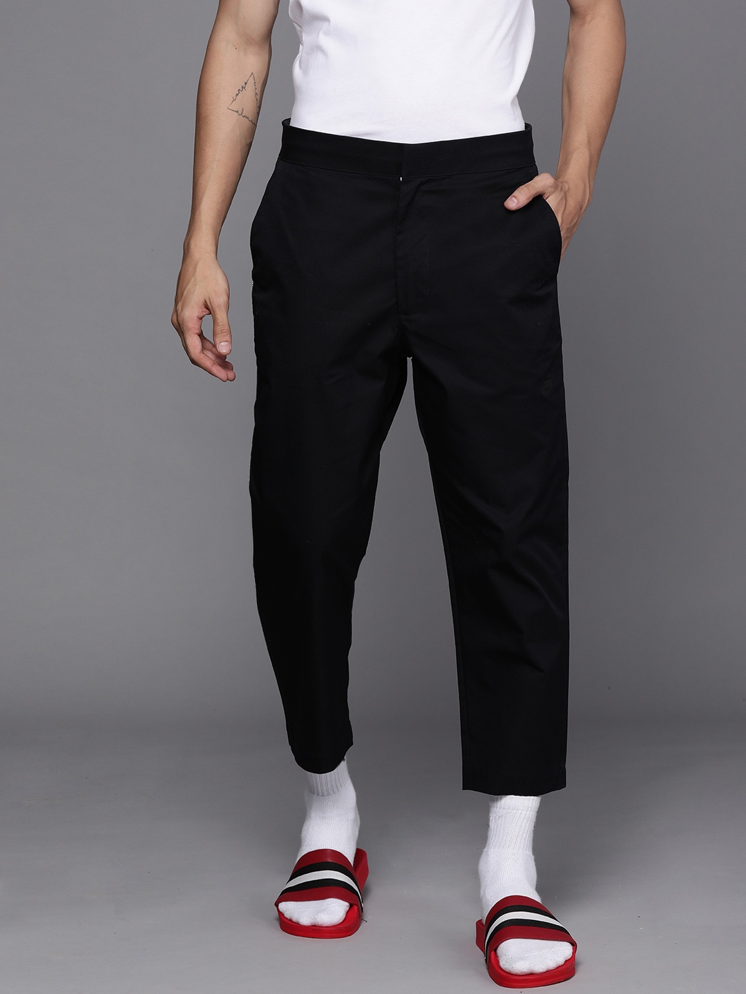

Nike Men Black Solid Style Essentials Woven Unlined Cropped Sneaker Track Pants