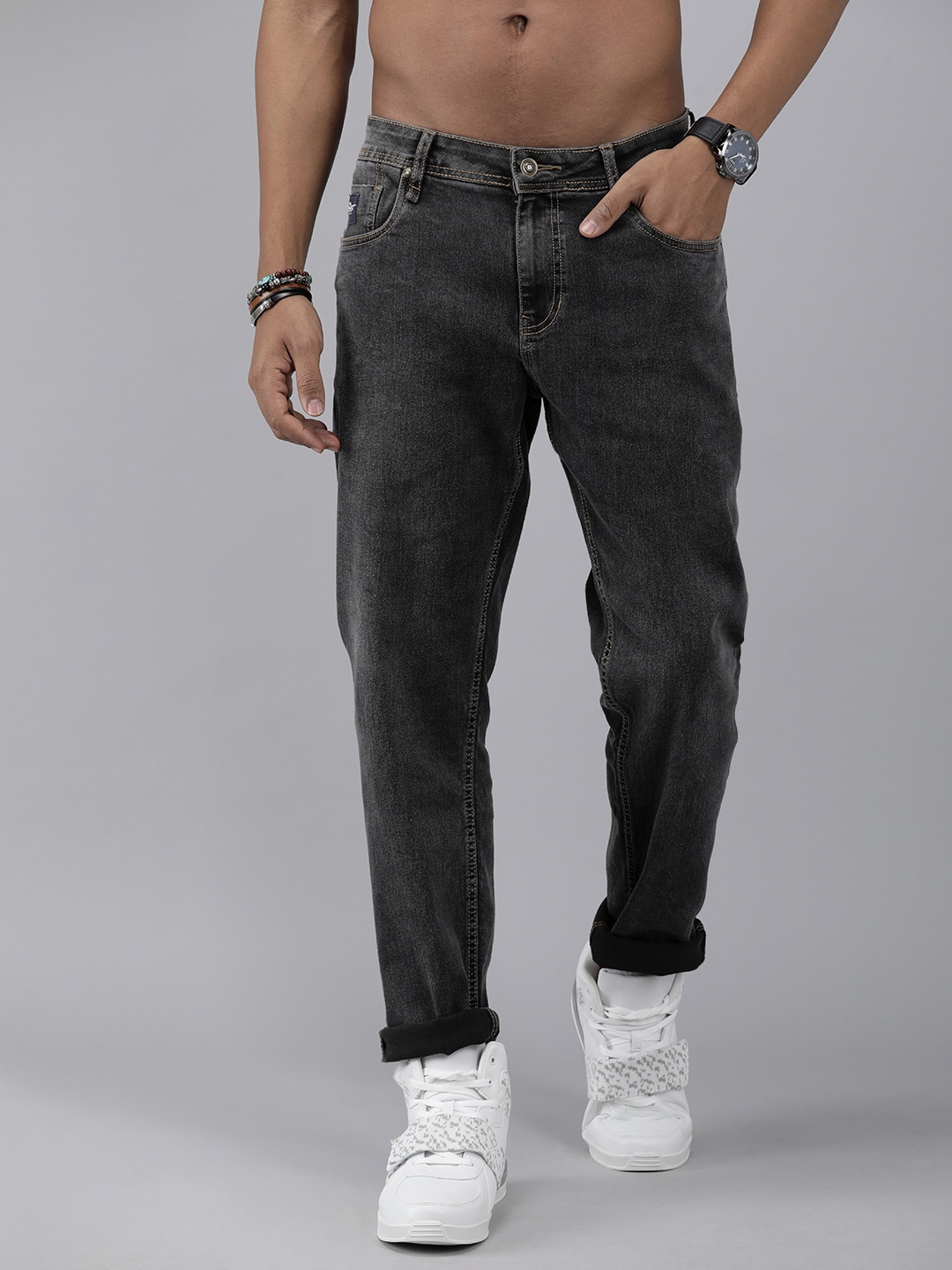 

Roadster Men Black Carrot Fit Mid Rise Light Fade Jeans