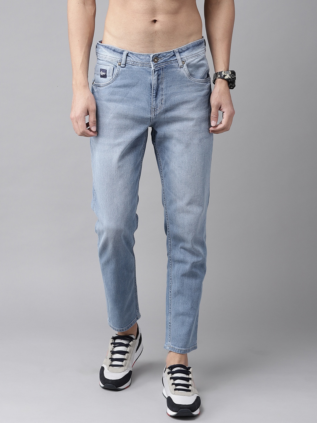 

Roadster Men Blue Solid Heavy Fade Mid-Rise Carrot Stretchable Jeans