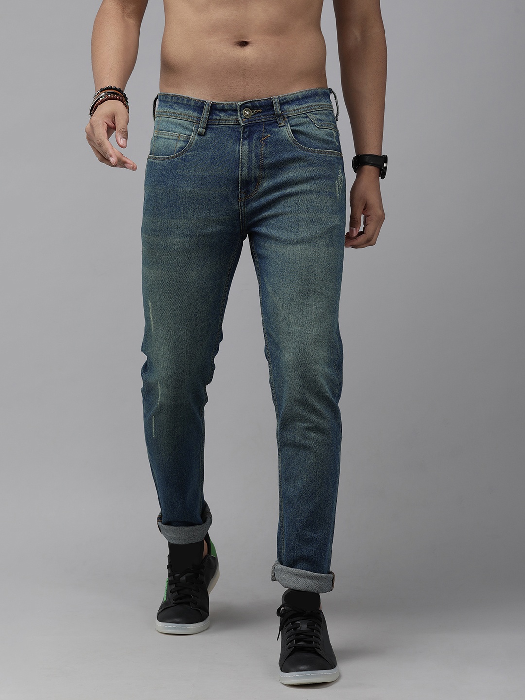 

Roadster Men Blue Skinny Fit Mildly Distressed Light Fade Stretchable Jeans