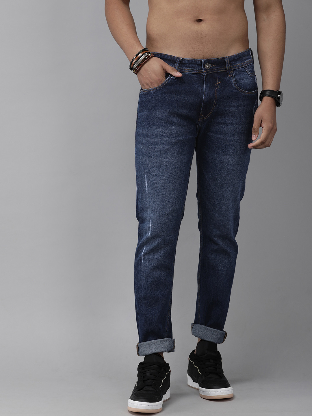 

Roadster Men Blue Skinny Fit Mildly Distressed Heavy Fade Stretchable Jeans