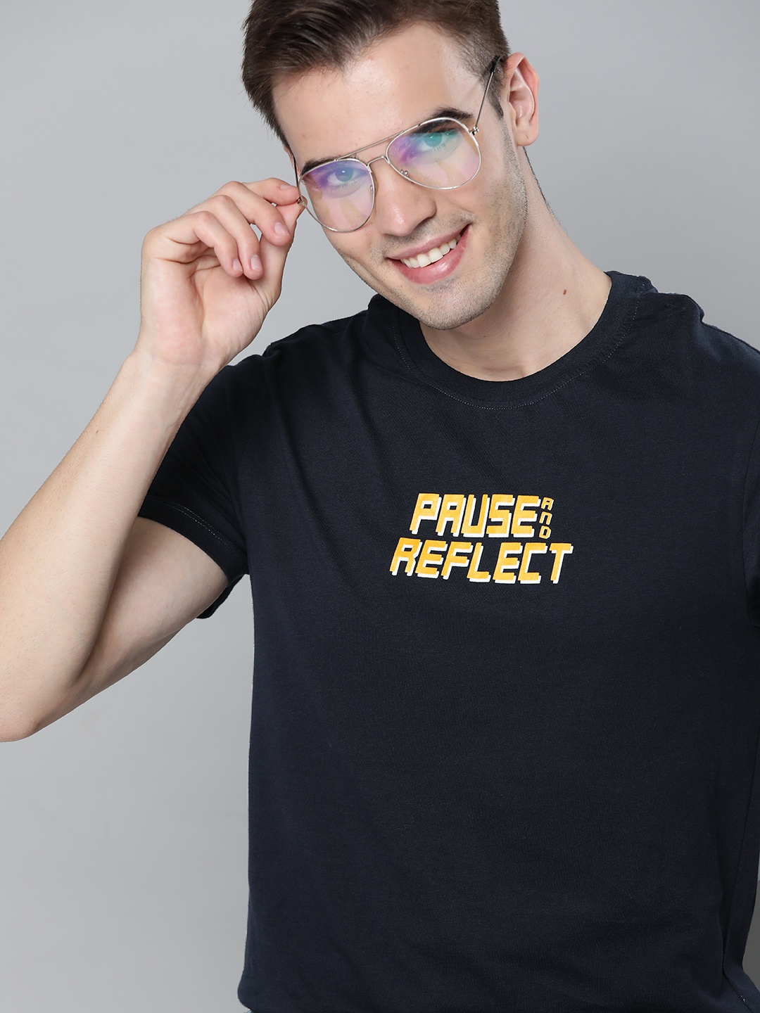 

Mast & Harbour Men Navy Blue & Mustard Yellow Pure Cotton Typography Printed T-shirt