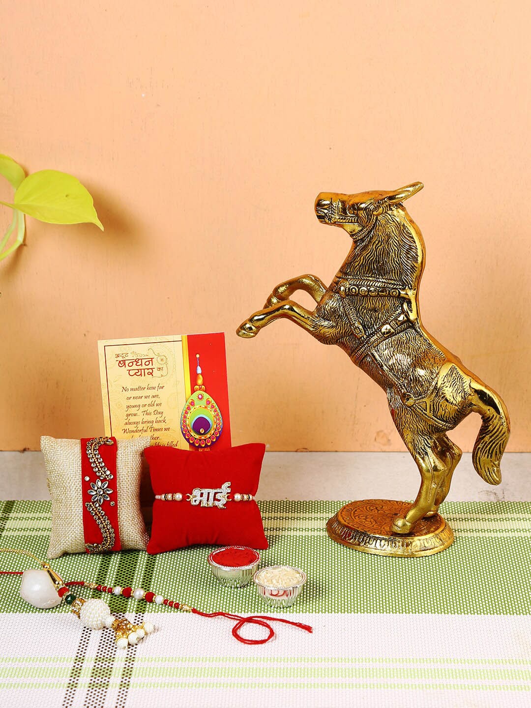 

CraftVatika Set Of 4 Rakhi For Men With Gift Uplifted Metal Horse Feng Shui Showpiece, Multi