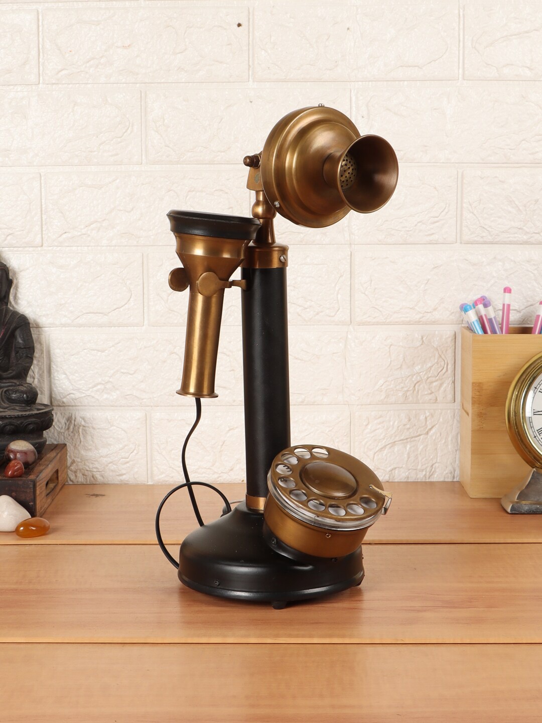 

EXIM DECOR Black & Gold-Toned Antique Candle Style Telephone Showpiece