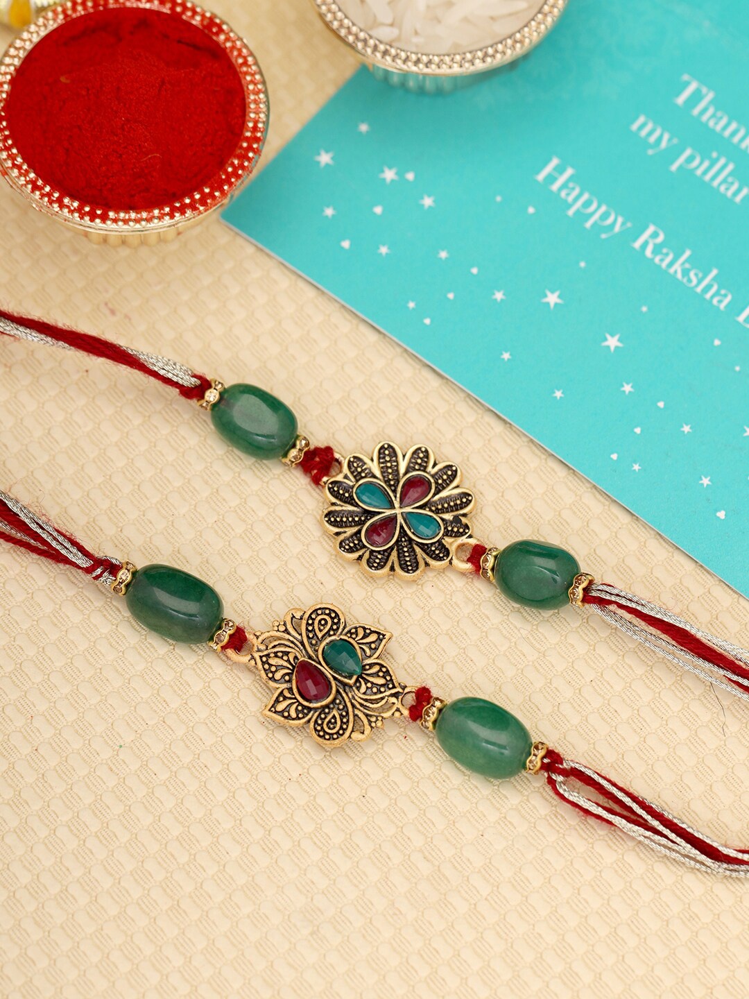 

Voylla Graceful Set of 2 Rakhi with Roli Chaawal, Red