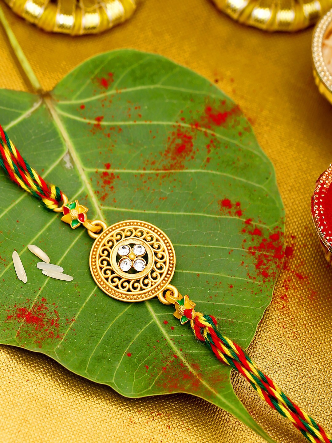 

Voylla Stone Studded Designer Rakhi with Roli Chaawal, Gold