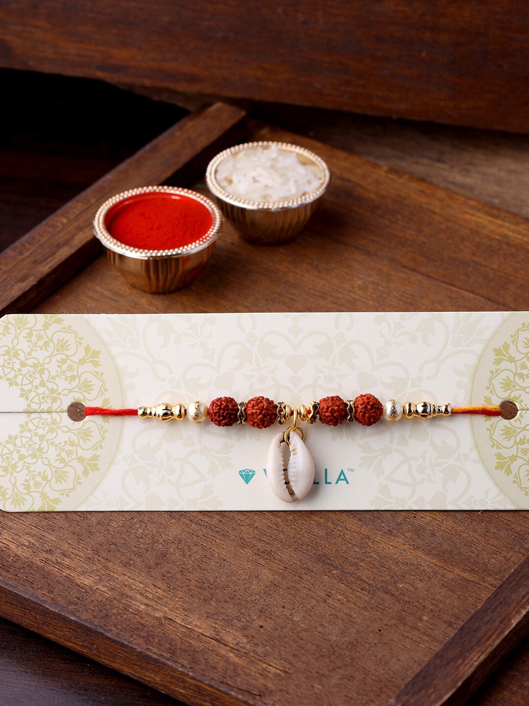 

Voylla Divine Rudraksha Rakhi With Cowrie Shell, Red
