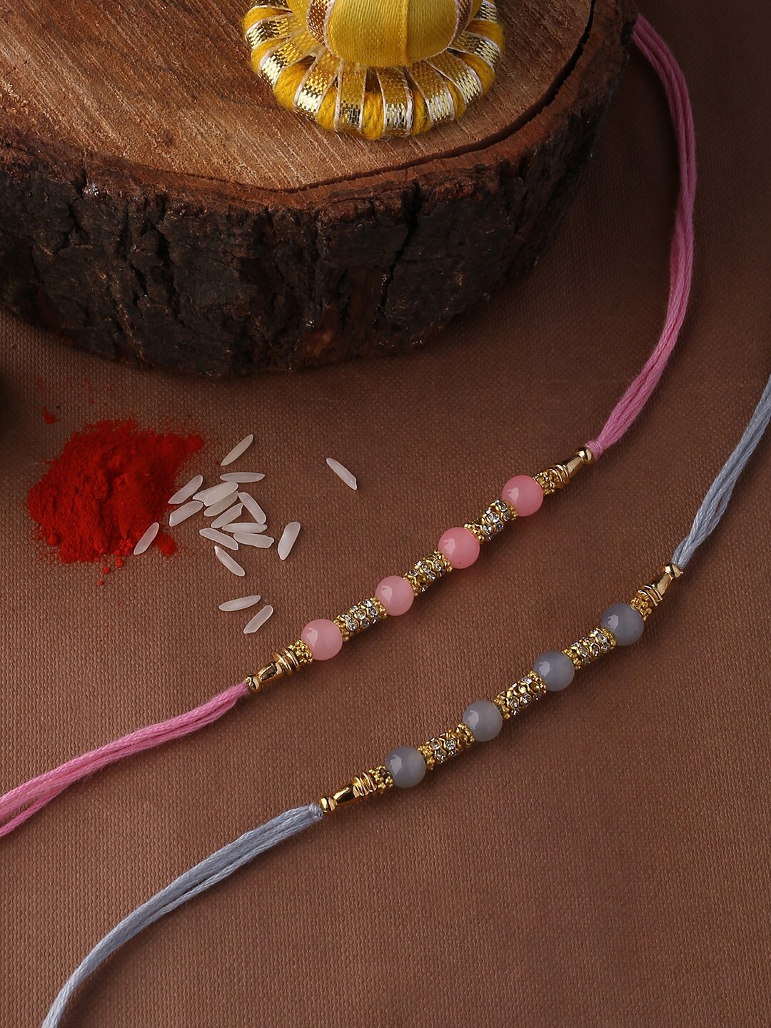

Studio Voylla Set of 2 Sterling Rakhi with Roli Chaawal Pack, Pink
