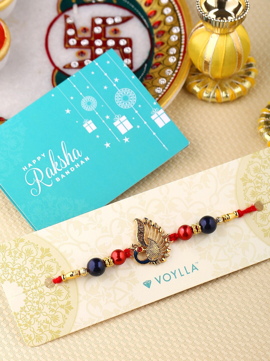 

Voylla Designer Enameled Peacock Shaped Rakhi, Red