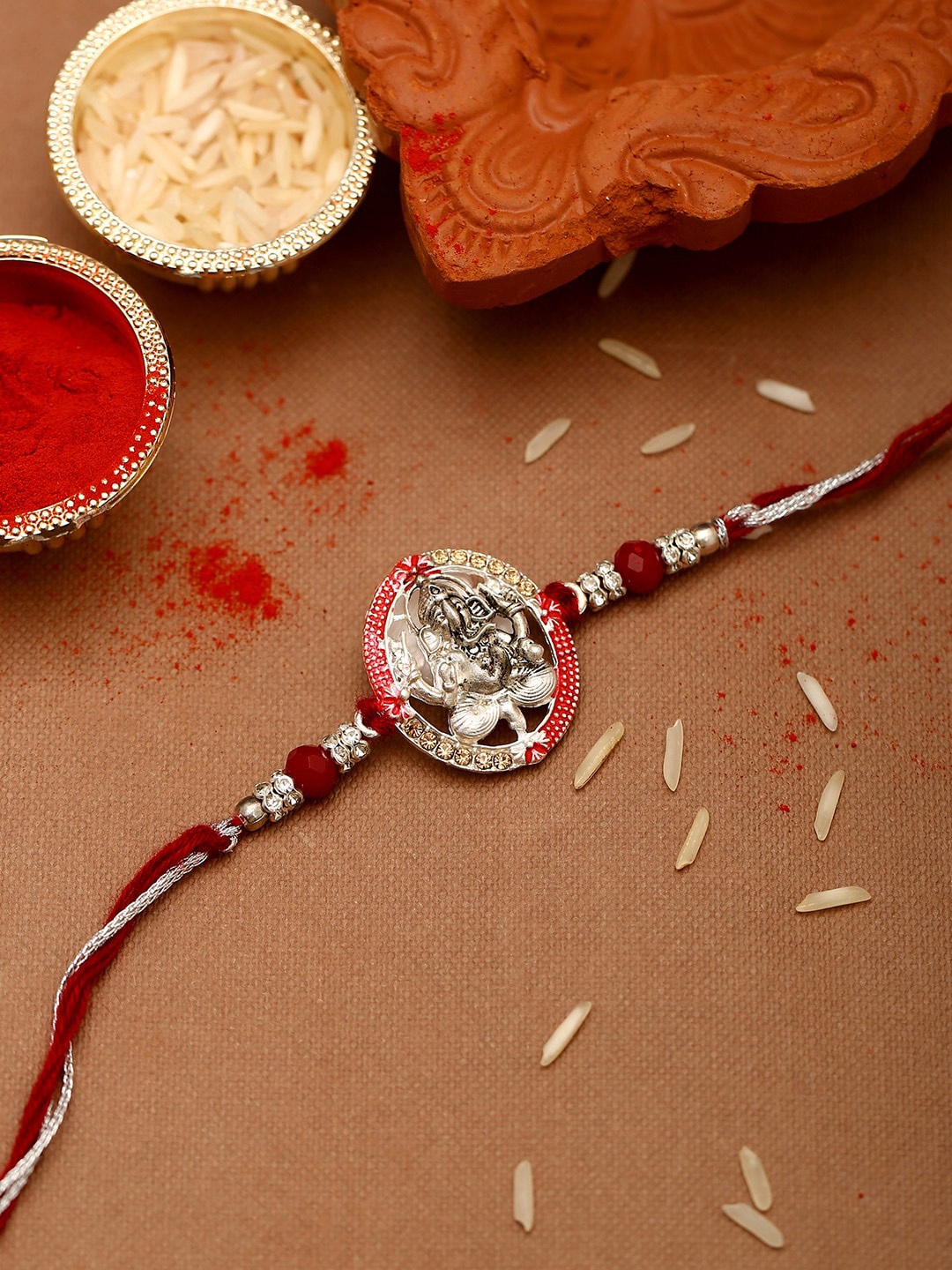

Voylla Silver-Toned Ganesha Rakhi with Roli Chaawal, Red