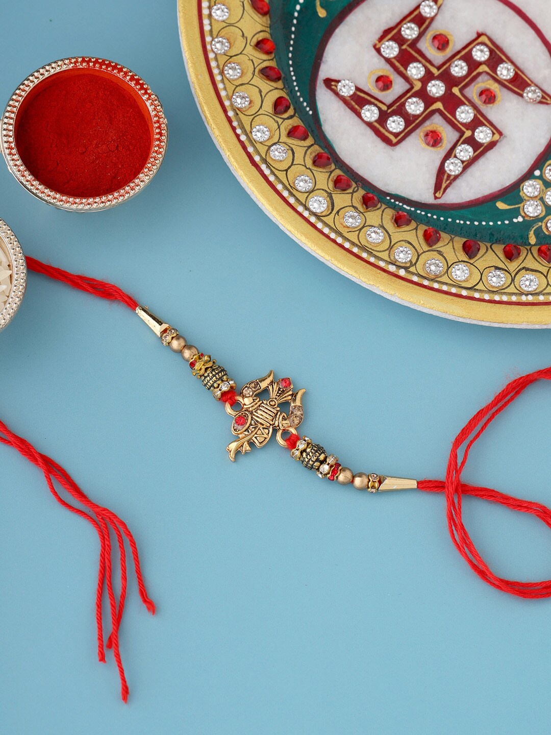 

Voylla Designer Ganesha Rakhi with Roli Chaawal Pack, Red