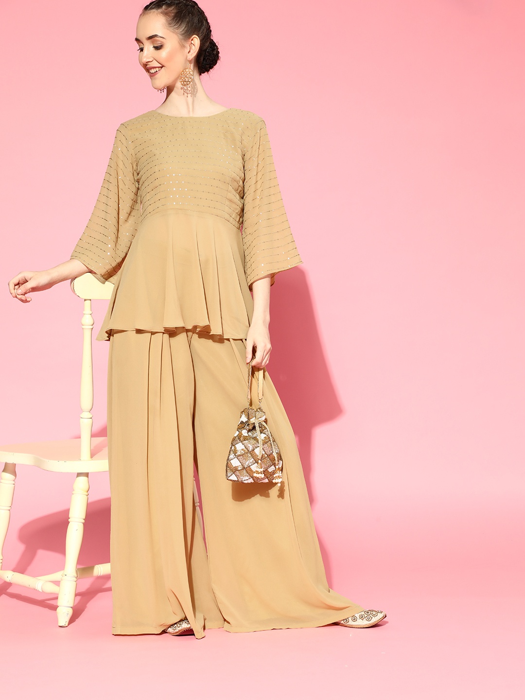 

Inddus Women Beige Sequinned Kurti with Palazzos