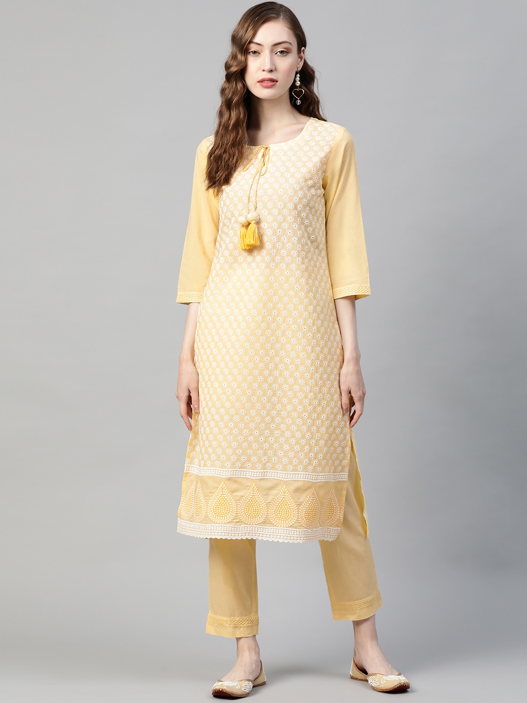 

PIROH Women Yellow & White Embroidered Thread Work Pure Cotton Kurta with Trousers