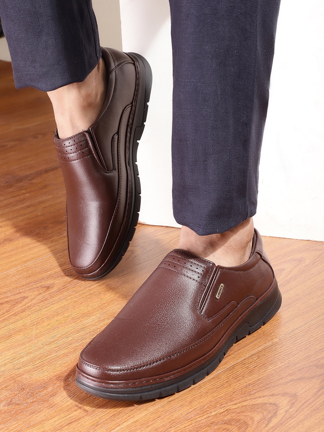 

Liberty Men Brown Solid Formal Shoes