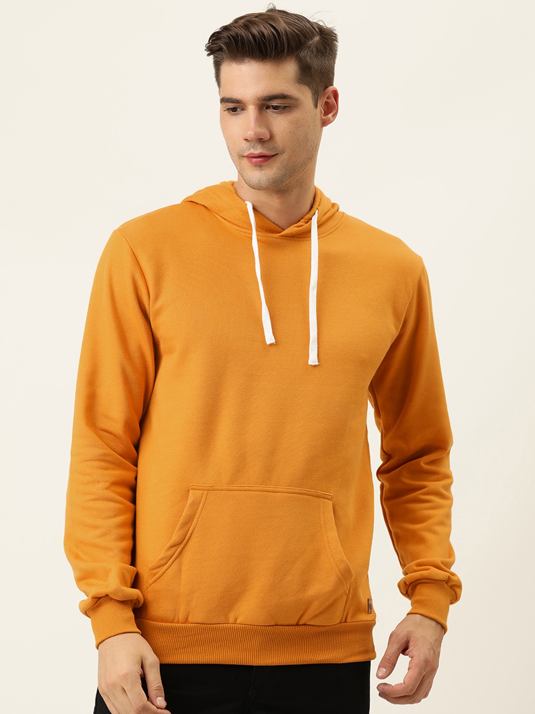 

Campus Sutra Men Orange Solid Hooded Sweatshirt