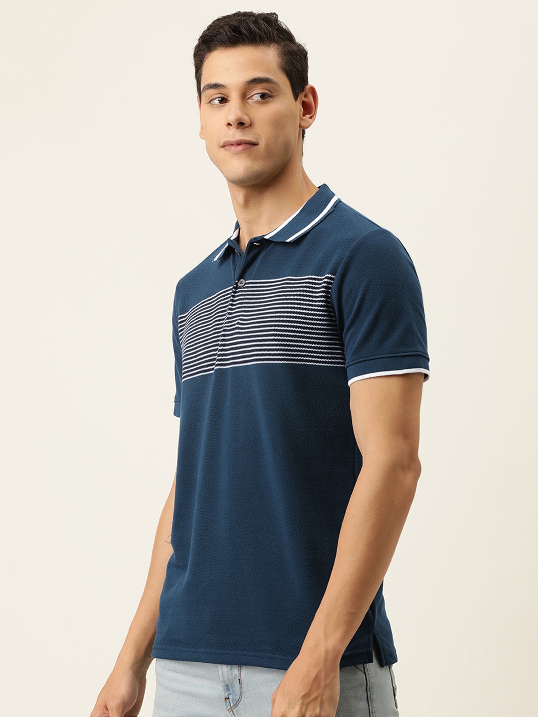 

Campus Sutra Men Blue & White Striped Polo Collar T-shirt