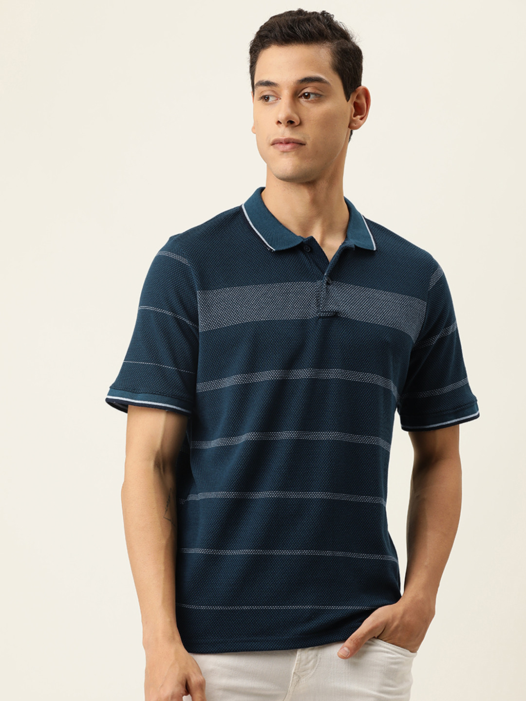 

Campus Sutra Men Teal Blue & White Striped Polo Collar T-shirt