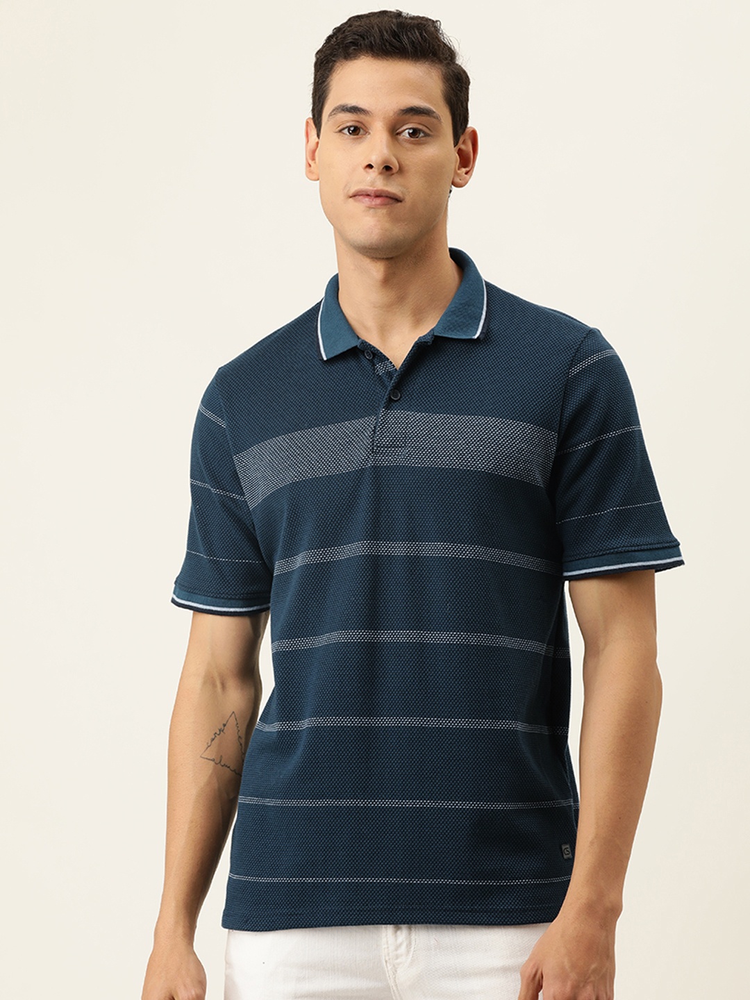 

Campus Sutra Men Teal Green & White Striped Polo Collar T-shirt