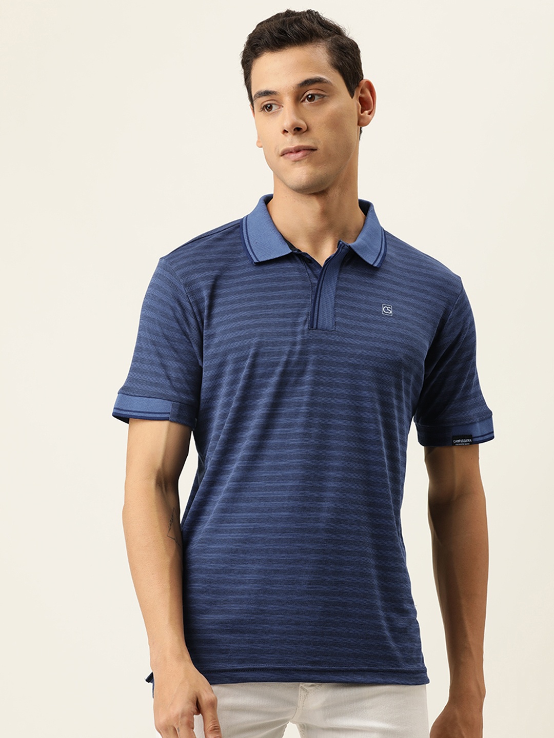 

Campus Sutra Men Navy Blue Striped Polo Collar T-shirt