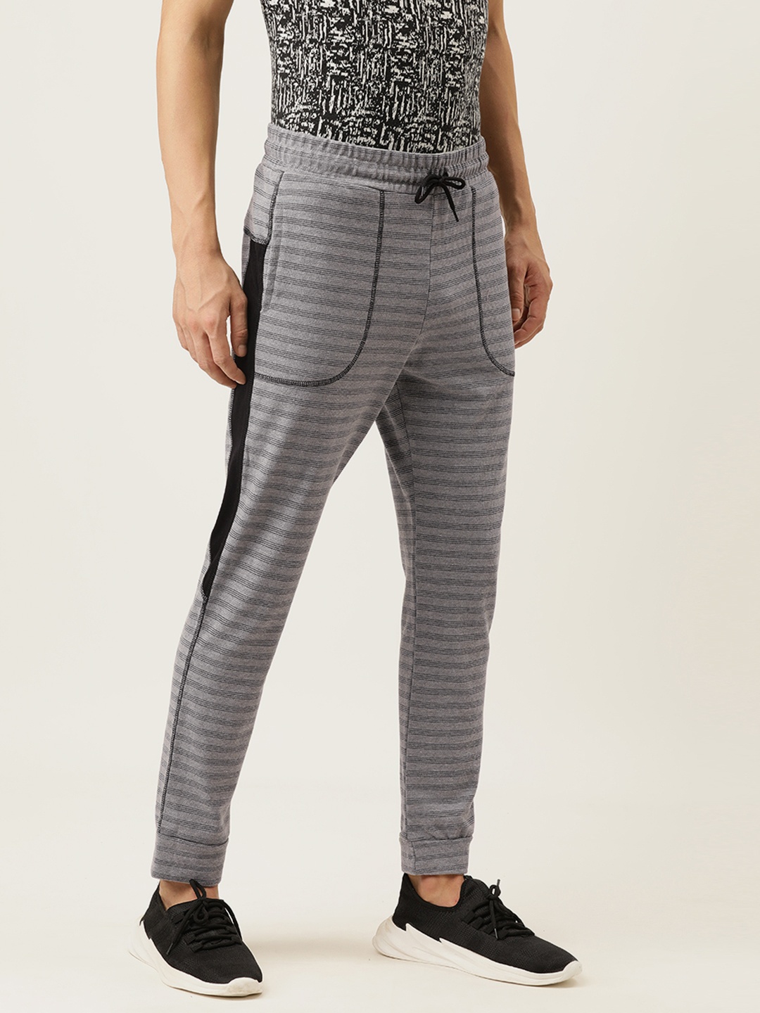 

Campus Sutra Men Grey & Black Striped Straight Fit Joggers With Side Stripes