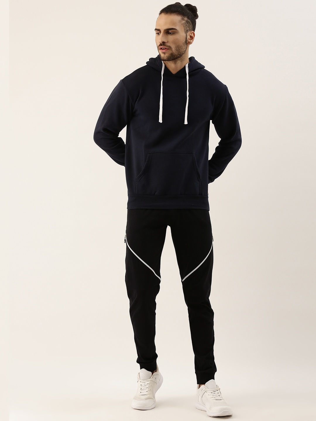 

Campus Sutra Men Navy Blue & Black Solid Pure Cotton Casual Tracksuit