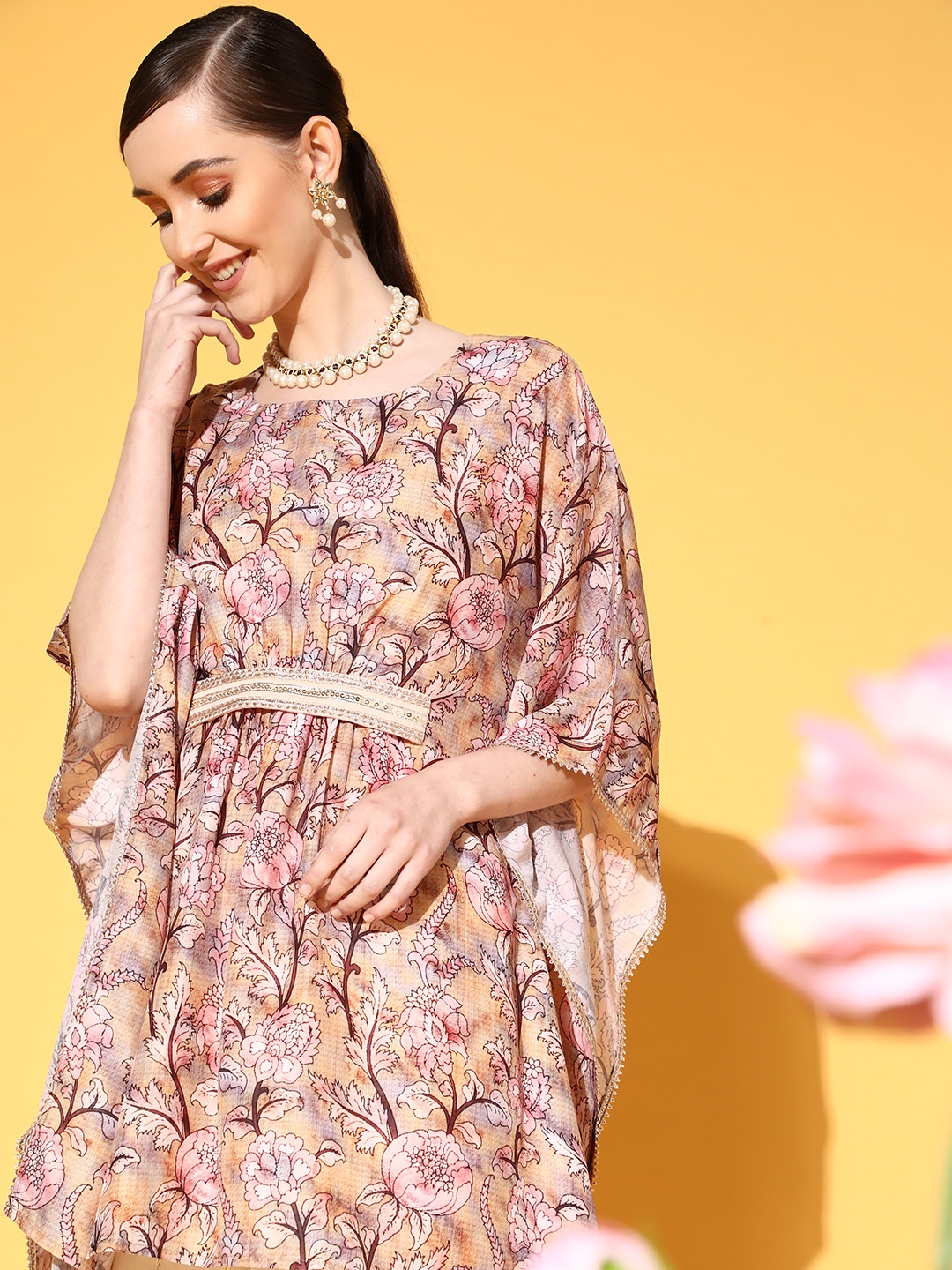 

Varanga Women Attractive Peach Printed Tunic with Striped Palazzo