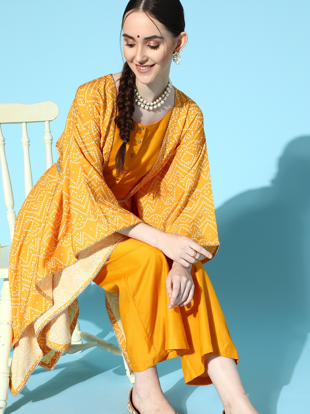 

Varanga Women Stylish Mustard Printed Tunic with Solid Palazzo