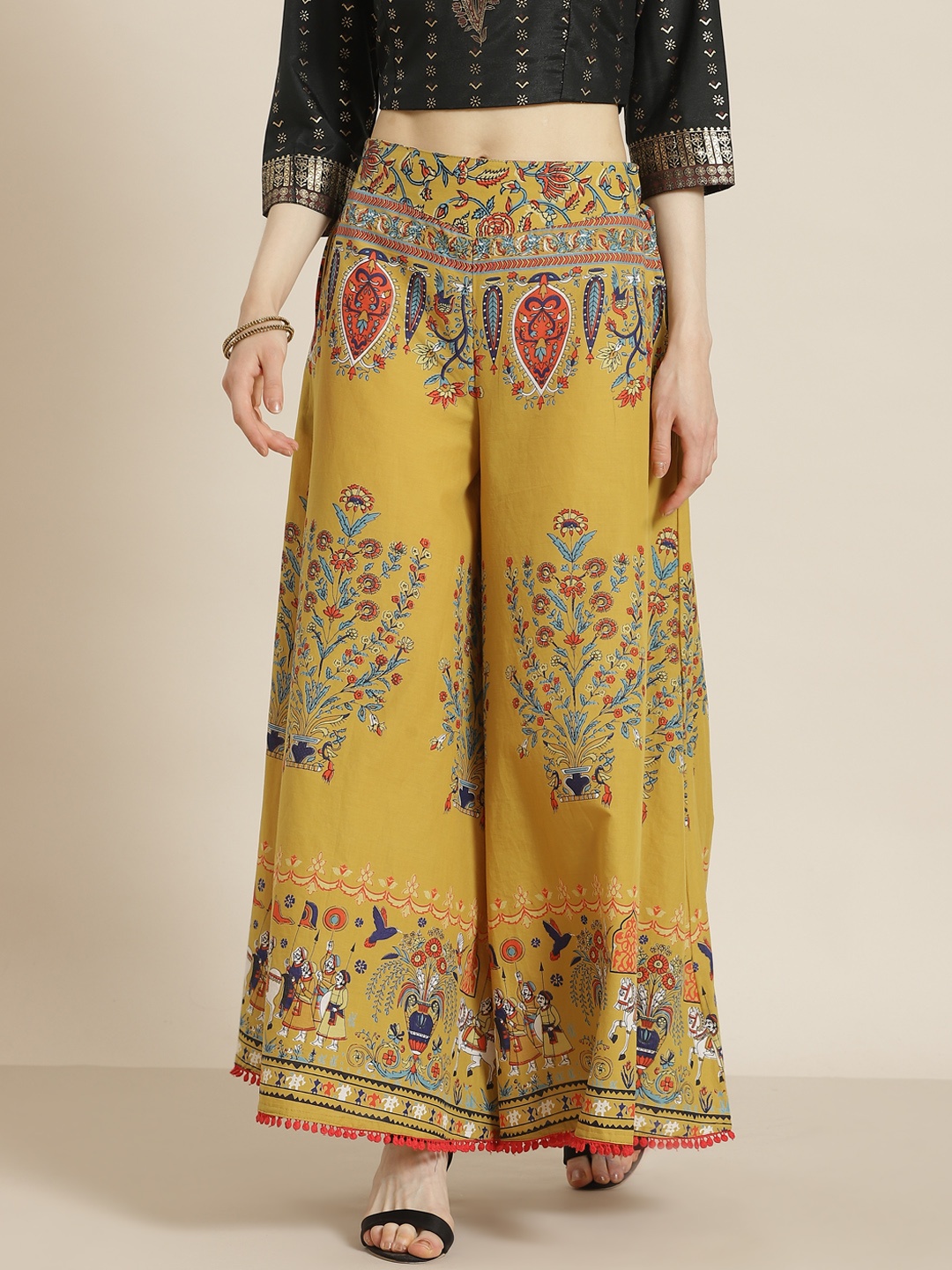 

Juniper Women Mustard Yellow & Red Ethnic Motifs Printed Cotton Flared Palazzos