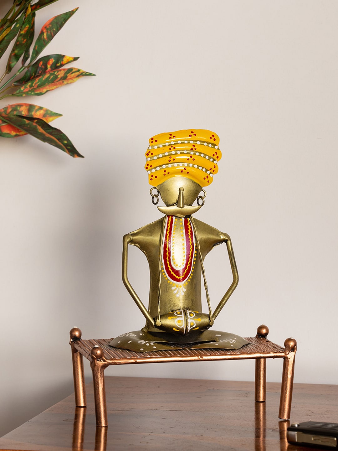 

ExclusiveLane Gold-Toned & Yellow Handpainted Decorative Iron Showpiece