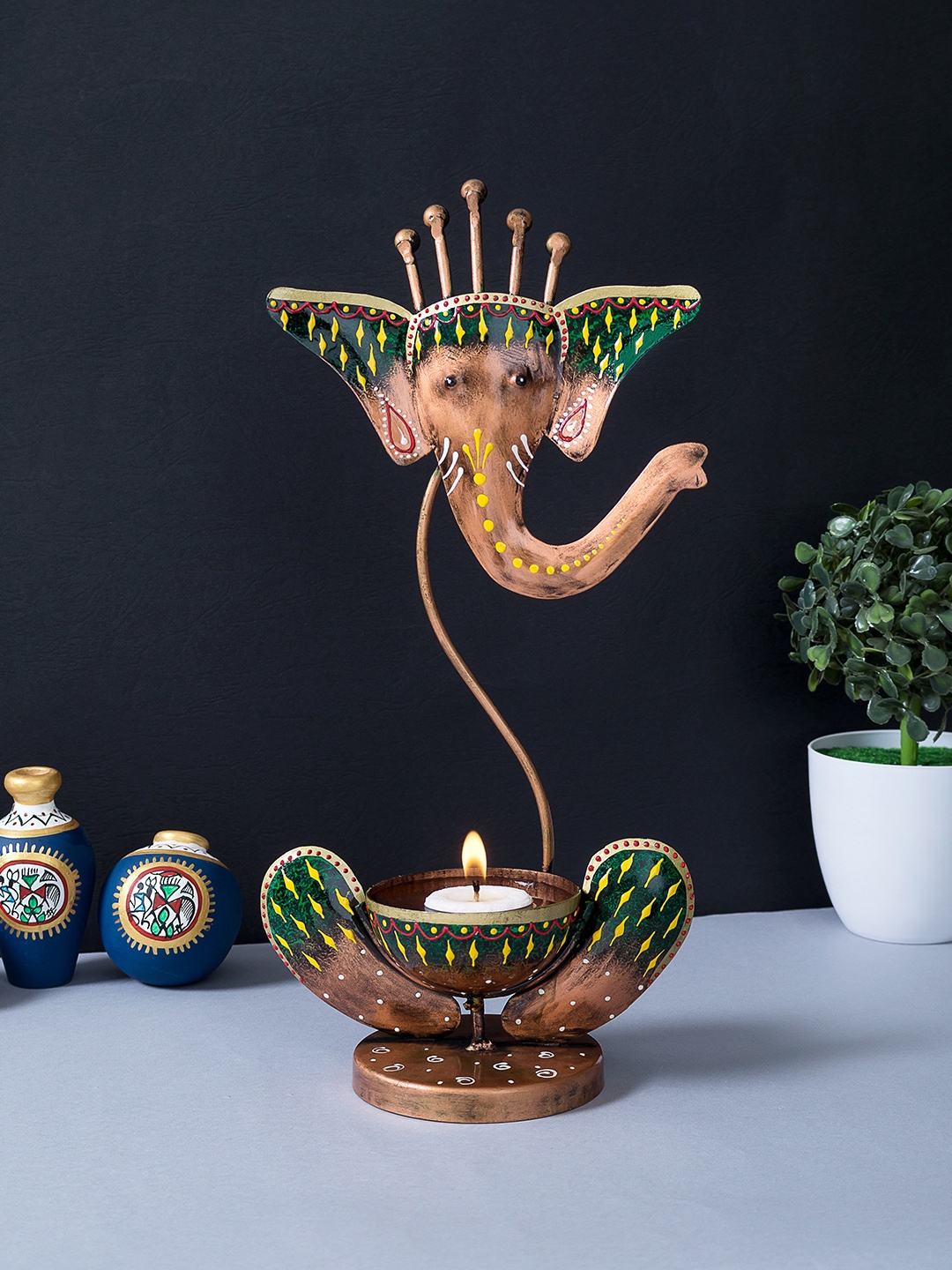 

Golden Peacock Copper-Toned & Green Ganesha Tea Light Candle Holder