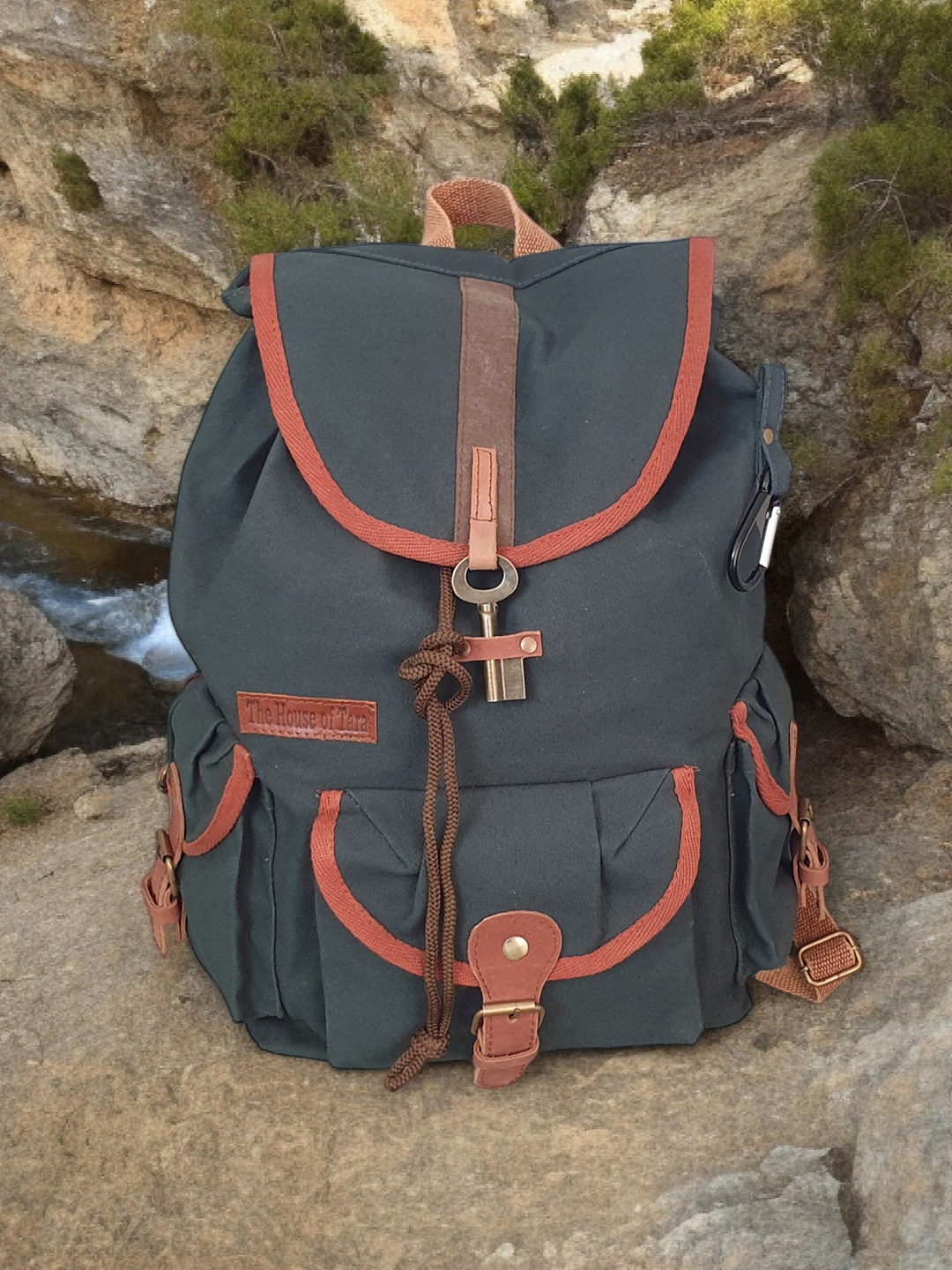 

The House of Tara Unisex Green & Red Backpack