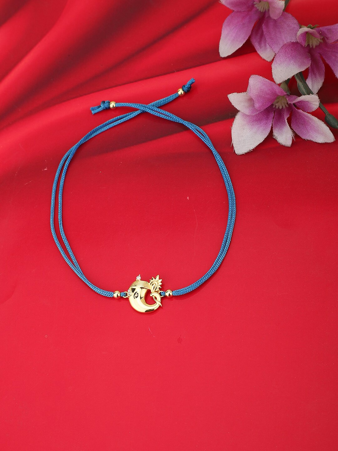 

Carlton London Gold & Blue 925 Sterling Silver Charm Thread Rakhi